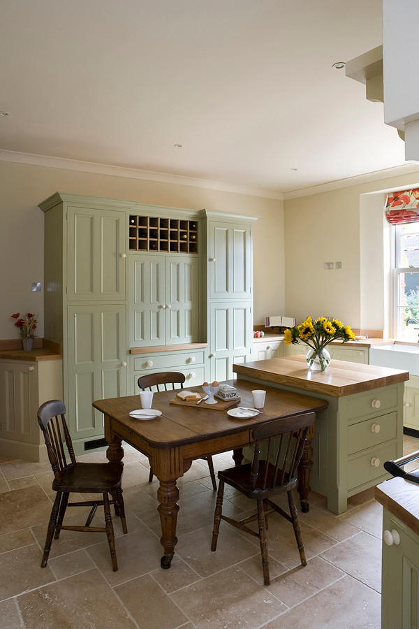 Design ideas for a rural kitchen in Other with beaded cabinets and wood worktops.