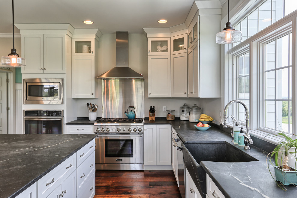 Example of a country kitchen design in Other