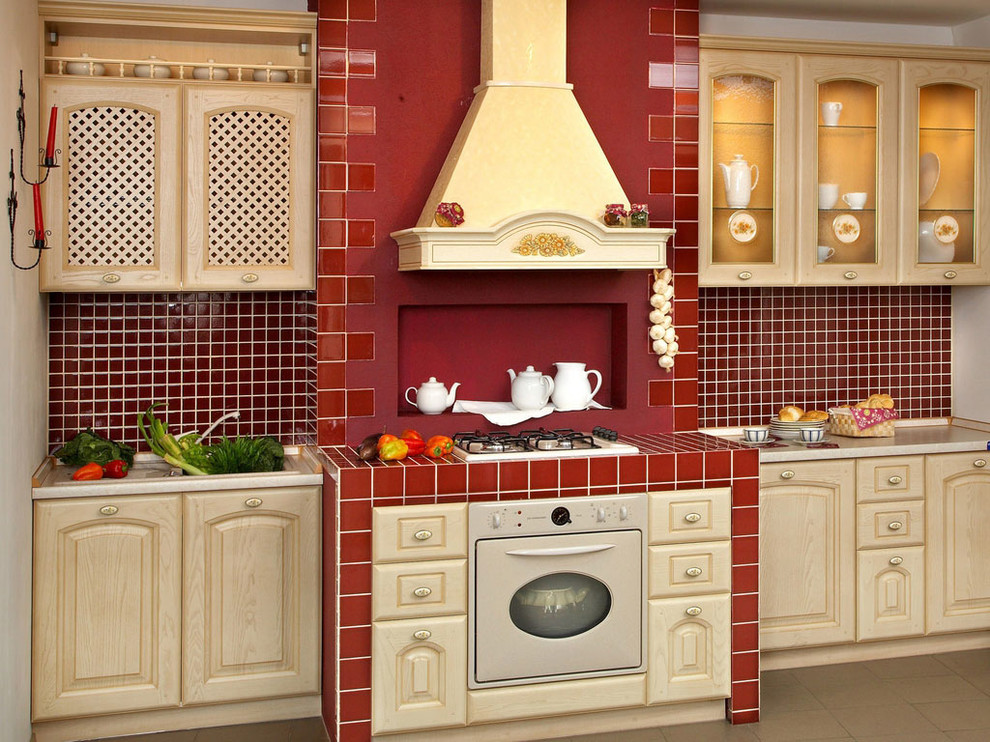 Inspiration for a mid-sized mediterranean single-wall ceramic tile open concept kitchen remodel in Other with a single-bowl sink, glass-front cabinets, beige cabinets, marble countertops, brown backsplash, mosaic tile backsplash, stainless steel appliances and no island