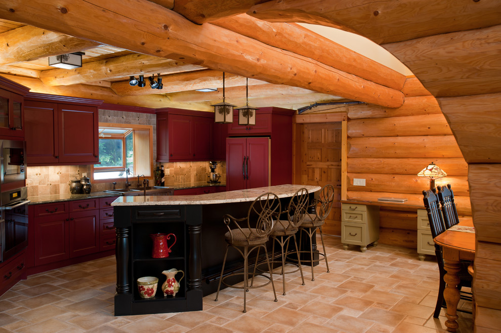 Urige Küche mit roten Schränken und Mauersteinen in Portland