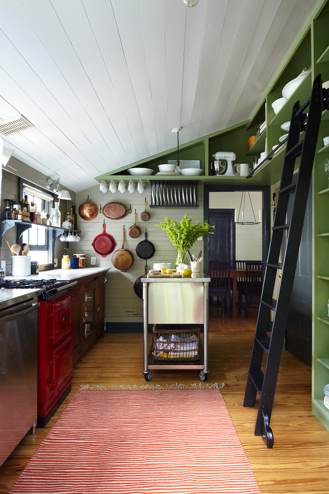 Inspiration for a cottage enclosed kitchen remodel in Austin with open cabinets, green cabinets and colored appliances