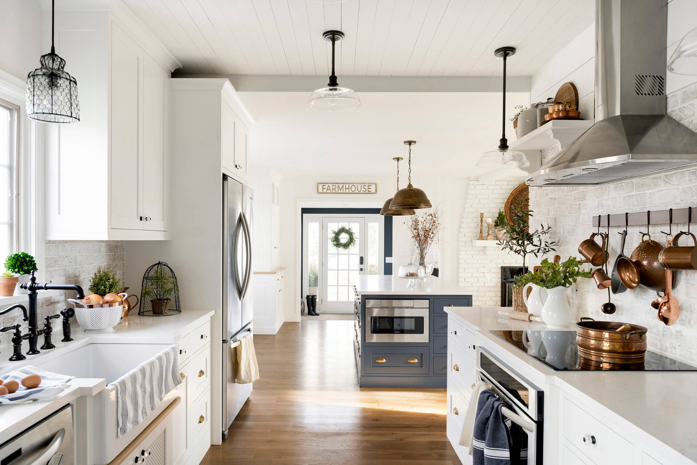 farmhouse kitchen with brick backsplash