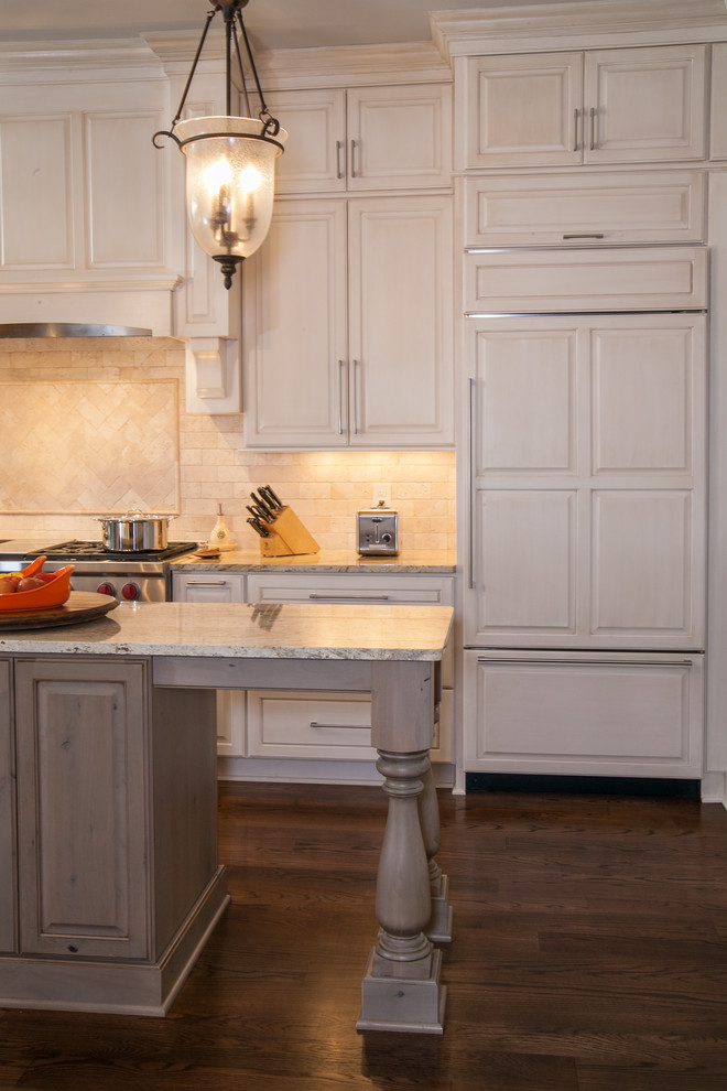 Example of a mid-sized classic l-shaped medium tone wood floor eat-in kitchen design in New Orleans with a single-bowl sink, beaded inset cabinets, white cabinets, granite countertops, multicolored backsplash, cement tile backsplash, stainless steel appliances and an island