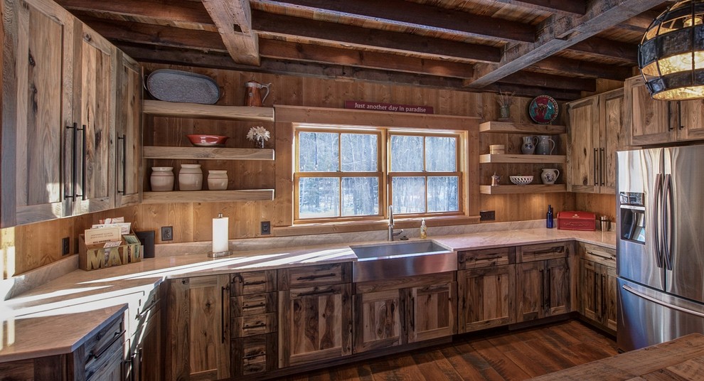Large mountain style u-shaped eat-in kitchen photo in Minneapolis with a farmhouse sink, flat-panel cabinets, distressed cabinets, quartzite countertops, wood backsplash, stainless steel appliances and an island