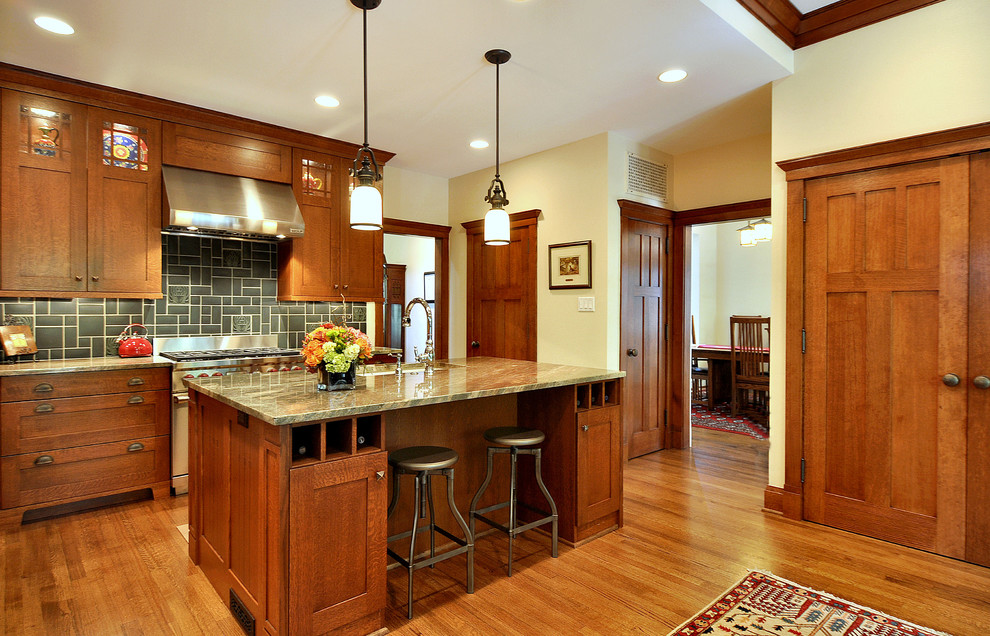 Arts and crafts kitchen photo in Dallas with shaker cabinets, medium tone wood cabinets, granite countertops and gray backsplash