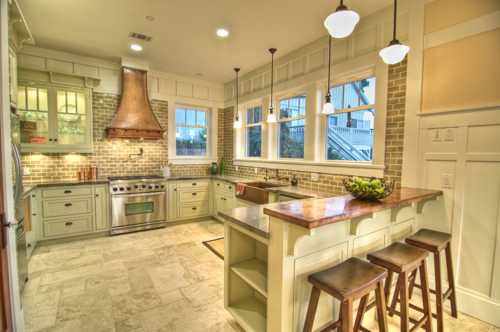 Example of an arts and crafts kitchen design in Orange County