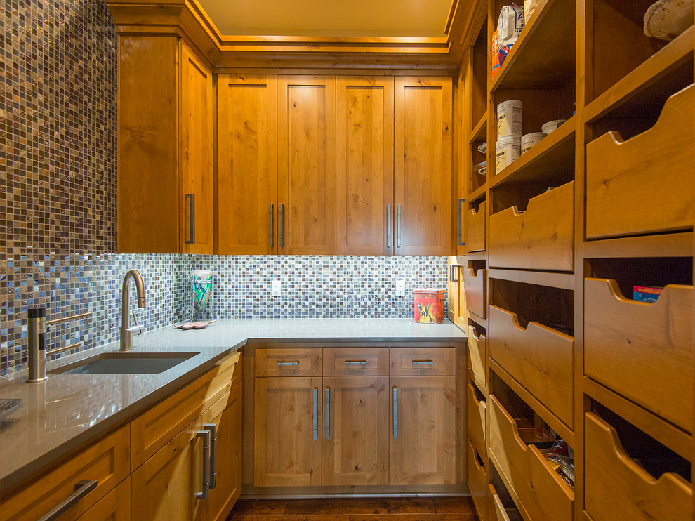 This is an example of a rustic kitchen pantry in Portland with a submerged sink, shaker cabinets, medium wood cabinets, multi-coloured splashback, mosaic tiled splashback and grey worktops.