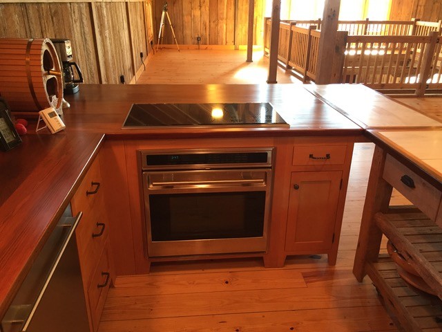 Example of a mountain style kitchen design in Portland
