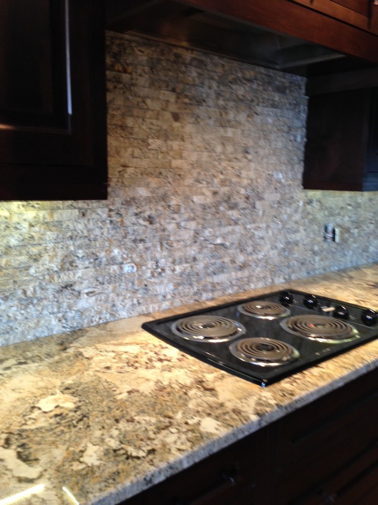 Example of a mountain style kitchen design in Calgary