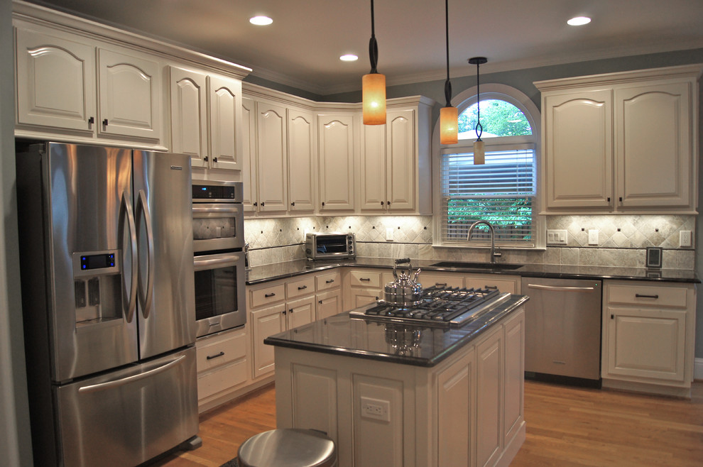 Kitchen - traditional kitchen idea in Atlanta with granite countertops