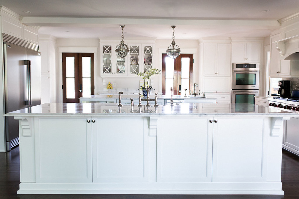 Inspiration for a large classic kitchen in Charleston with a belfast sink and an island.