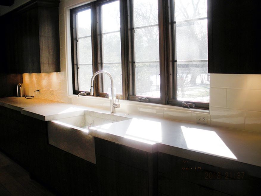 Creme Quartz kitchens with Dark Contemporary Kitchen