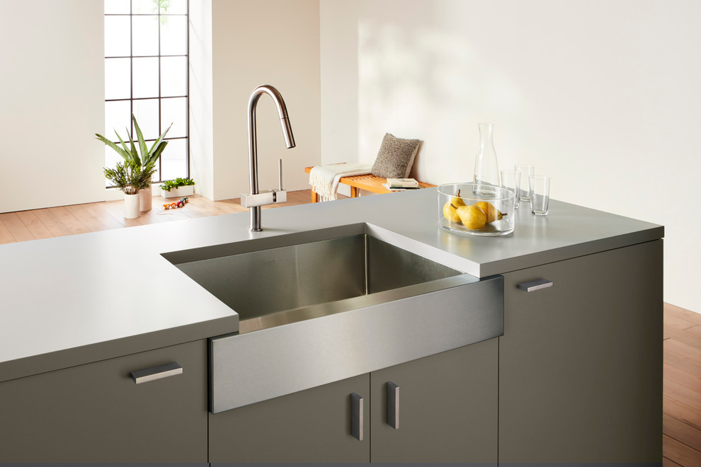 Design ideas for a contemporary kitchen in Chicago with a belfast sink, grey cabinets and grey worktops.