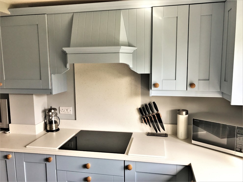 Crown Imperial Midsomer Kitchen in Mid Blue with Minerva Ice Crystal worktops Farmhouse