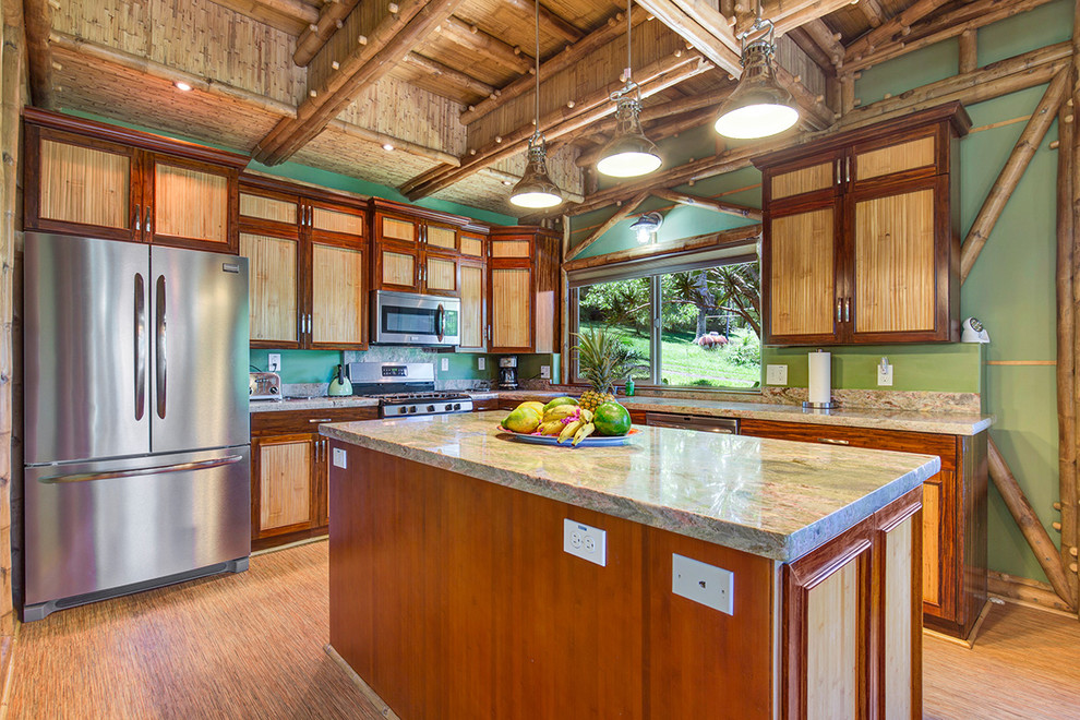 Design ideas for a world-inspired l-shaped open plan kitchen in Hawaii with stainless steel appliances, bamboo flooring and an island.