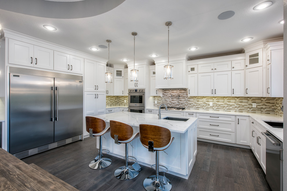 Inspiration for a large transitional dark wood floor and brown floor eat-in kitchen remodel in Other with an undermount sink, flat-panel cabinets, white cabinets, wood countertops, brown backsplash, mosaic tile backsplash, stainless steel appliances, an island and white countertops