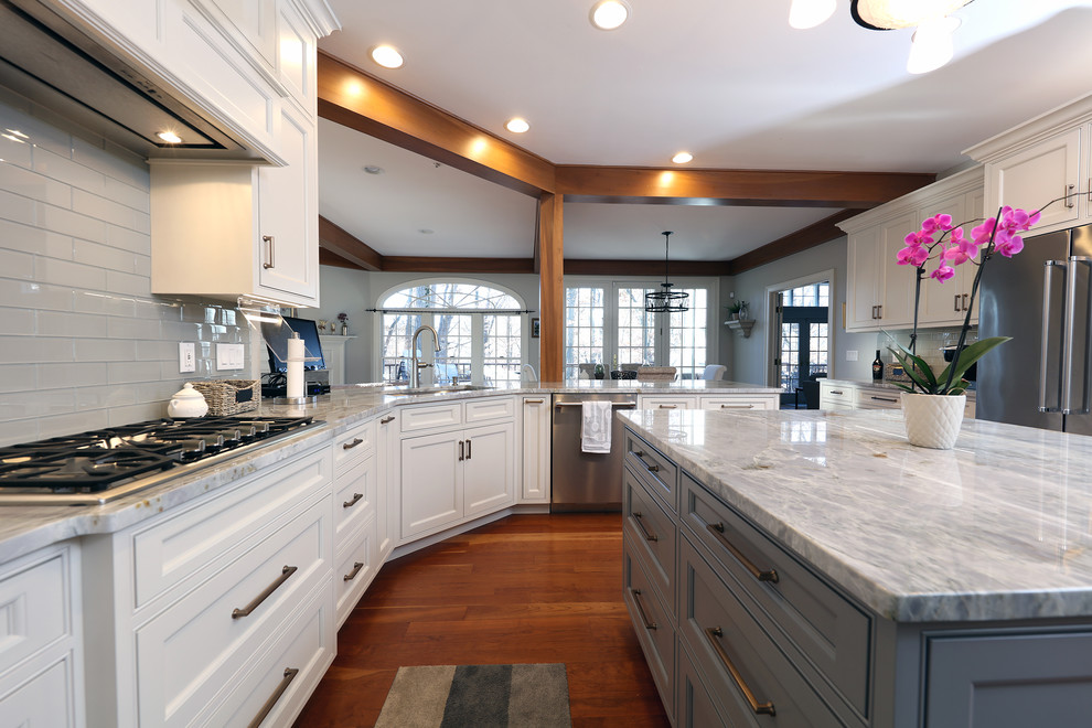 CustomBuilt White Kitchen and Gray Island Transitional