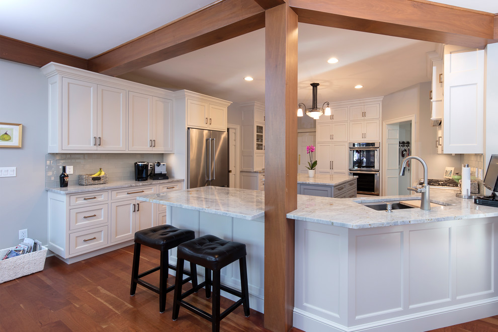 CustomBuilt White Kitchen and Gray Island Transitional