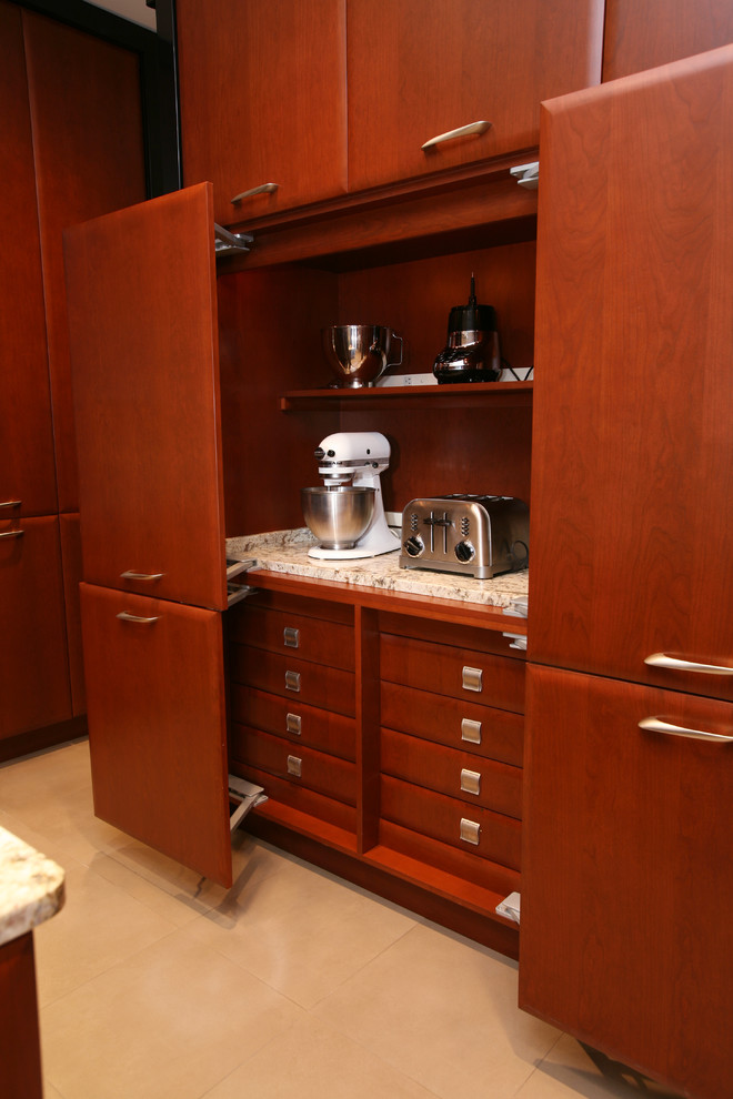 Inspiration for a contemporary galley ceramic tile open concept kitchen remodel in Newark with granite countertops and stainless steel appliances