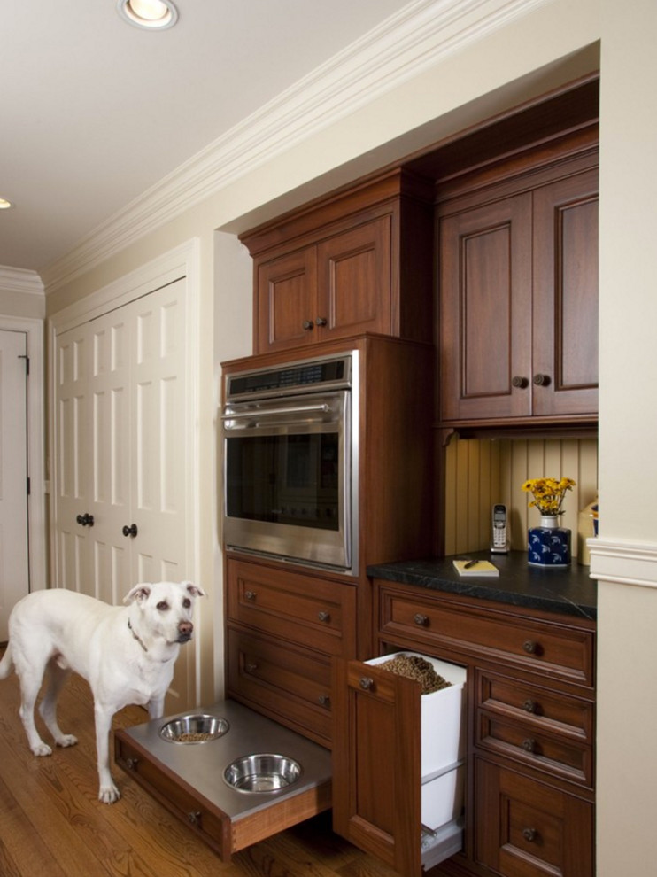 Kitchen - traditional medium tone wood floor kitchen idea in Other with soapstone countertops, yellow backsplash and stainless steel appliances