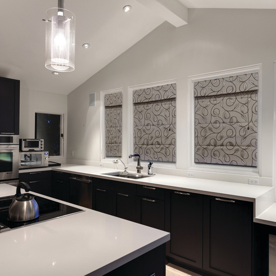 Kitchen - mid-sized modern u-shaped kitchen idea in Denver with an undermount sink, raised-panel cabinets, dark wood cabinets, onyx countertops and an island
