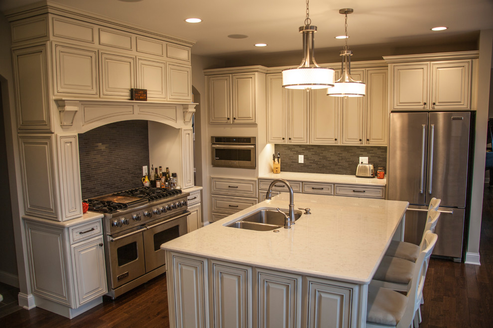 Design ideas for a classic kitchen in Chicago with granite worktops, dark hardwood flooring and an island.