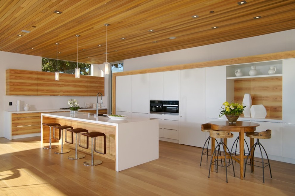 Example of a huge trendy limestone floor kitchen design in San Francisco