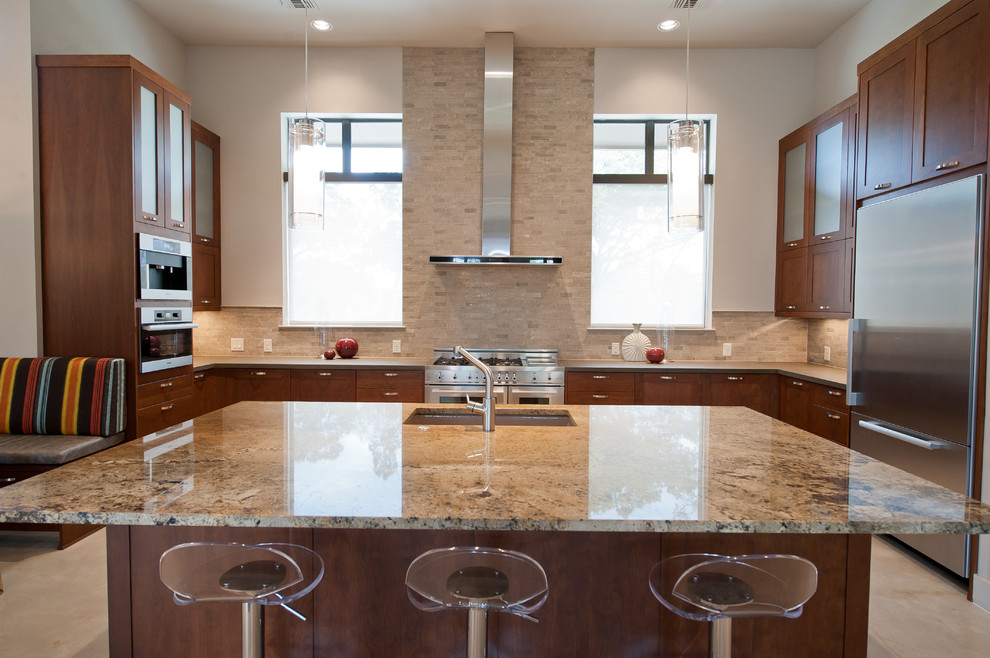 Trendy kitchen photo in Austin with granite countertops