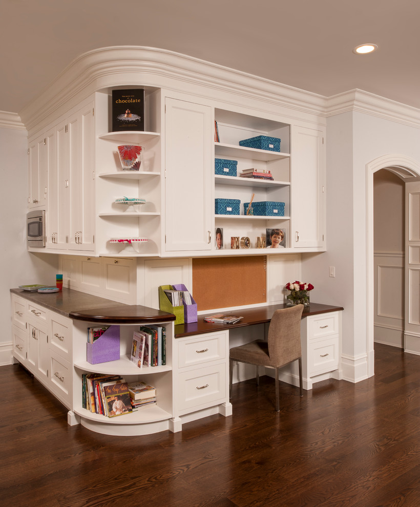 Inspiration for a timeless kitchen remodel in Raleigh with shaker cabinets, beige cabinets and wood countertops