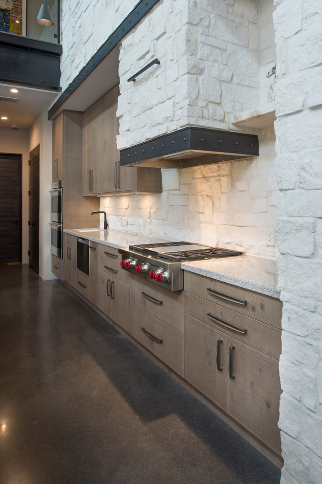 Inspiration for a mid-sized contemporary galley concrete floor and gray floor eat-in kitchen remodel in Houston with flat-panel cabinets, light wood cabinets, white backsplash, stone slab backsplash, stainless steel appliances, quartz countertops, an island and white countertops