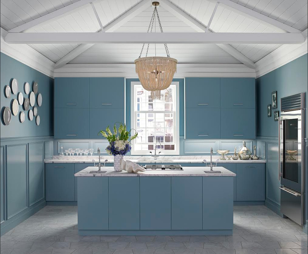 This is an example of a medium sized vintage galley kitchen/diner in Boston with a built-in sink, flat-panel cabinets, blue cabinets, granite worktops, stainless steel appliances, ceramic flooring and an island.