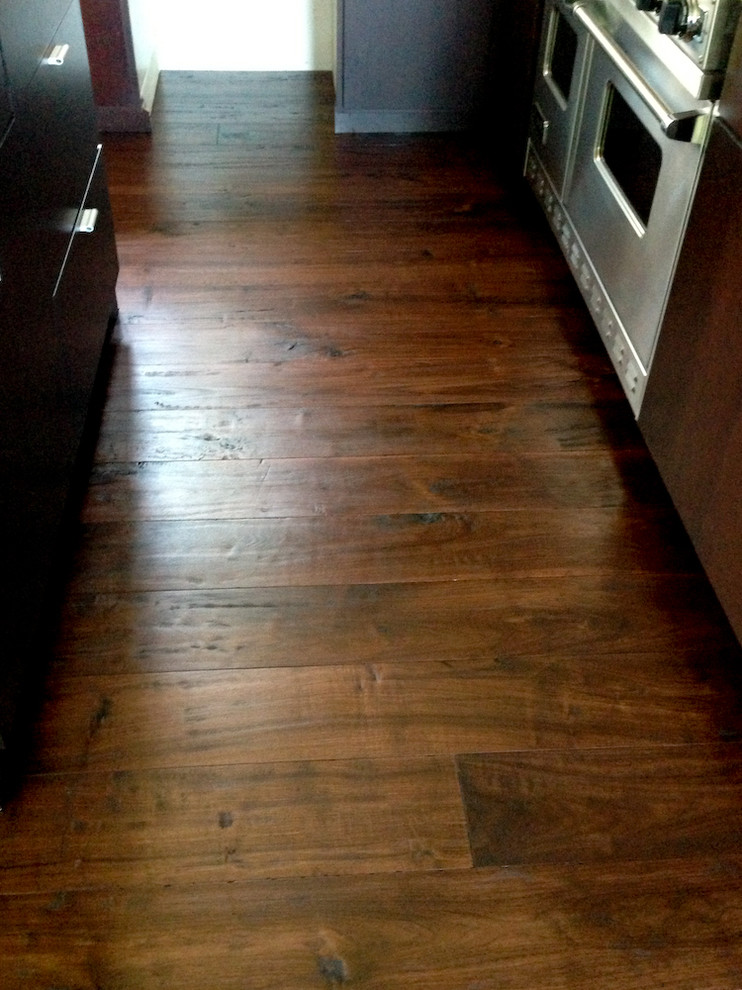 Example of a minimalist dark wood floor kitchen design in San Francisco