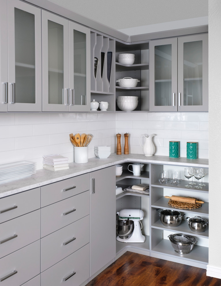 Inspiration for a medium sized modern kitchen pantry in Denver with shaker cabinets and grey cabinets.