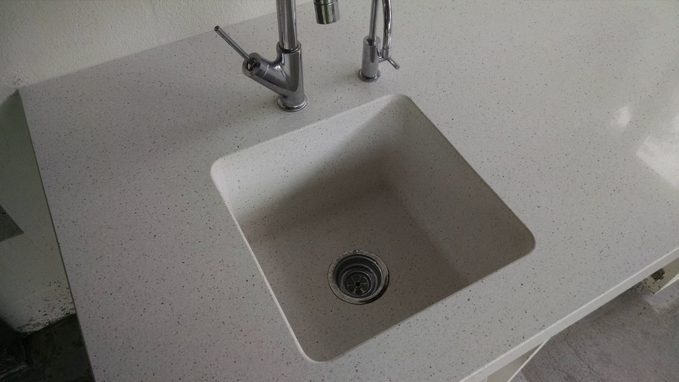 Custom quartz sink integrated into countertop Modern Kitchen Los