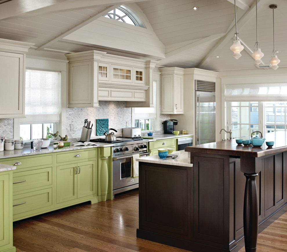 Inspiration for a timeless l-shaped eat-in kitchen remodel in Philadelphia with green cabinets, flat-panel cabinets and gray backsplash