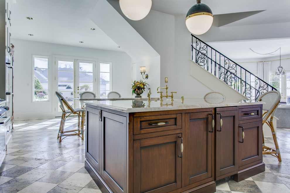 Large transitional marble floor open concept kitchen photo in Dallas with a farmhouse sink, beaded inset cabinets, white cabinets, quartzite countertops, white backsplash, ceramic backsplash, stainless steel appliances and two islands