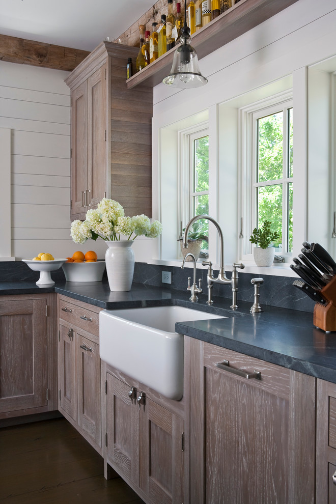 Eat-in kitchen - large coastal l-shaped dark wood floor eat-in kitchen idea in Bridgeport with a farmhouse sink, recessed-panel cabinets, distressed cabinets, gray backsplash, stainless steel appliances and an island