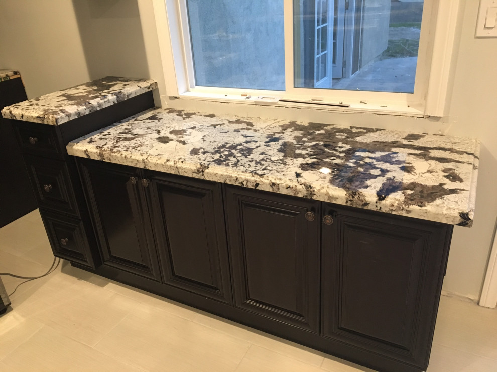 Dark espresso kitchen with Granite countertop Traditional