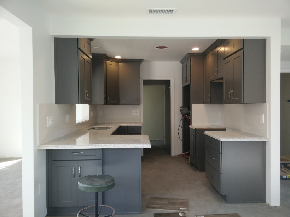 Dark grey shaker kitchen with Silestone Quartz slabs