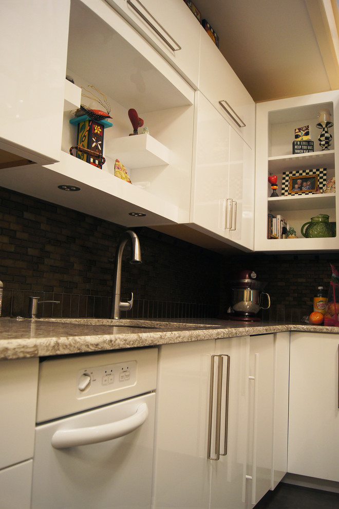 Photo of a medium sized contemporary l-shaped kitchen/diner in Other with a belfast sink, flat-panel cabinets, white cabinets, composite countertops, black splashback, mosaic tiled splashback, stainless steel appliances, ceramic flooring and an island.