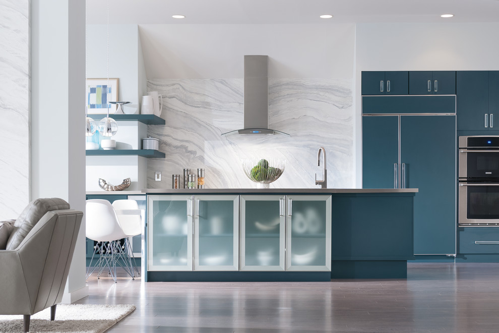 Inspiration for a medium sized modern kitchen/diner in Other with flat-panel cabinets, blue cabinets, stainless steel appliances, an island and grey floors.
