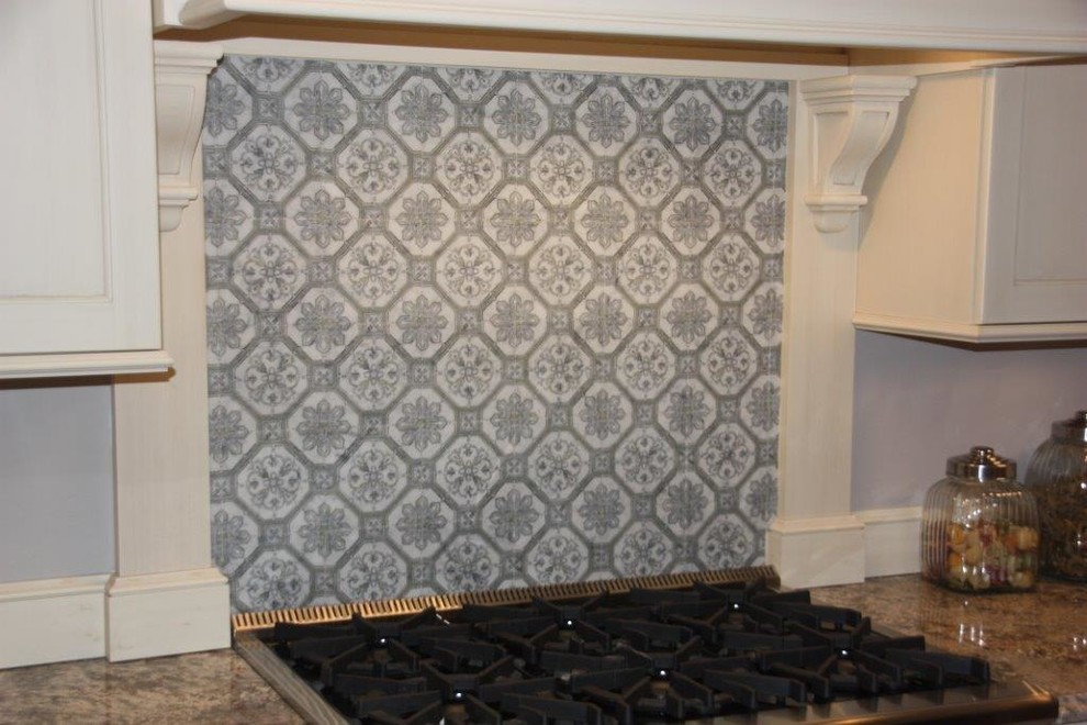 Kitchen - transitional kitchen idea in New York with multicolored backsplash and stone tile backsplash