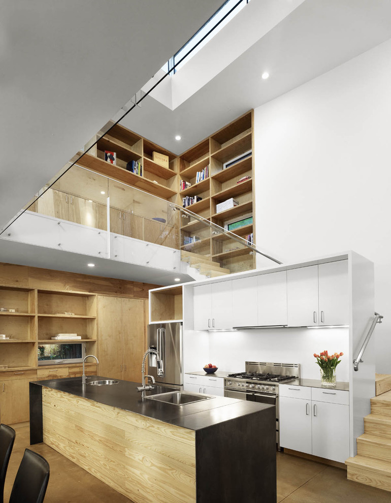 Design ideas for a modern kitchen in Austin with stainless steel appliances.
