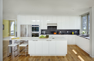 White Kitchen With Black Accessories Stock Photo - Download Image