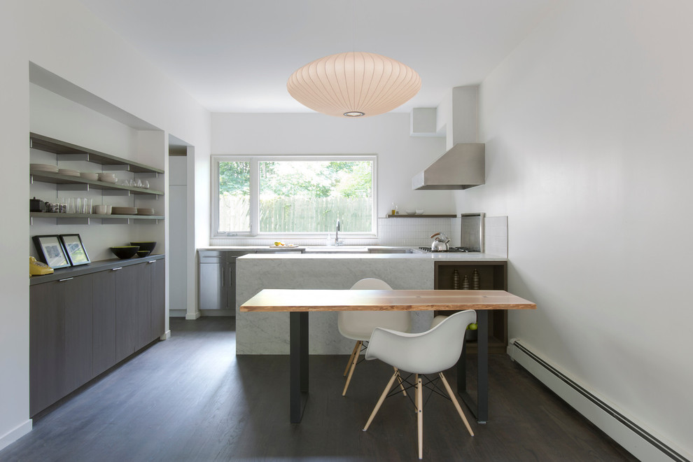 Contemporary kitchen/diner in New York with open cabinets, brown cabinets and white splashback.