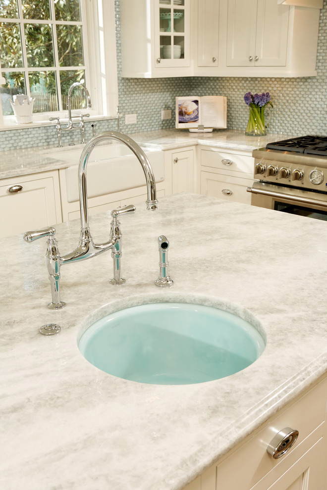 Kitchen - traditional kitchen idea in DC Metro with quartzite countertops
