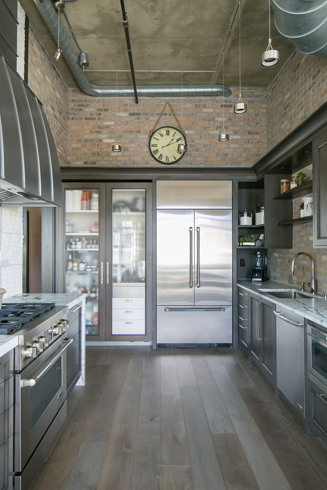 This is an example of a medium sized urban u-shaped kitchen in Denver with a submerged sink, quartz worktops, stainless steel appliances, medium hardwood flooring, no island, grey floors, recessed-panel cabinets, dark wood cabinets and brown splashback.