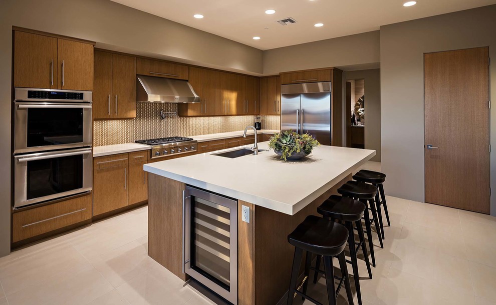 Inspiration for a contemporary l-shaped kitchen remodel in Other with an undermount sink, flat-panel cabinets, medium tone wood cabinets, multicolored backsplash, stainless steel appliances and an island