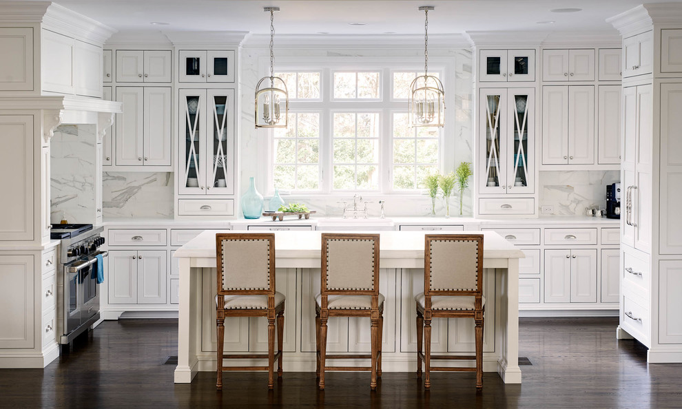 Kitchen - traditional u-shaped kitchen idea in Charlotte with a farmhouse sink, beaded inset cabinets, white cabinets and white backsplash