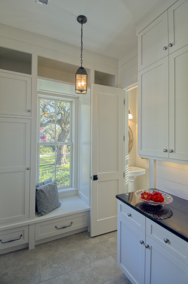 This is an example of a traditional kitchen in Charleston with shaker cabinets.